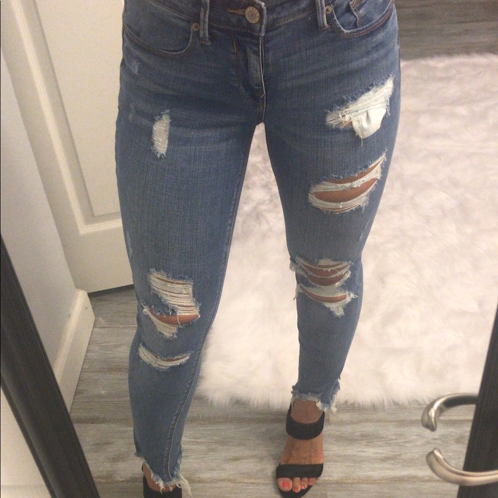 Express medium wash distressed skinny jeans